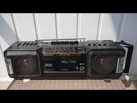 Видео: Sharp WQ-T281Z. Портативный "Твин" с серьезной начинкой