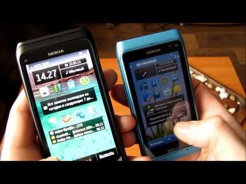 Видео: Nokia E7 против N8 [HD]