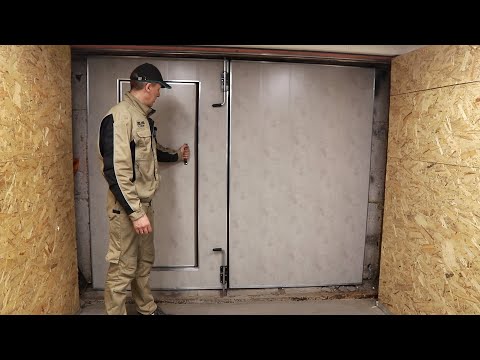 Видео: Утепление гаражных ворот