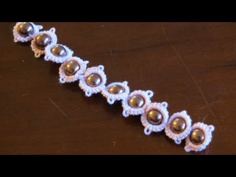 Видео: Разъемное кольцо с бусиной посередине