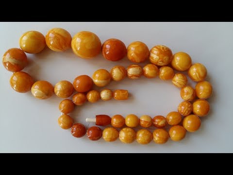 Видео: Янтарные бусы, пейзажный и карамельный янтарь, визуальные отличия