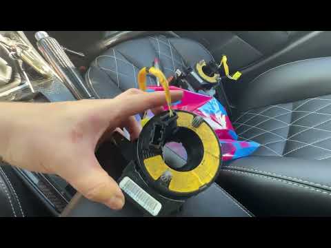 Видео: Замена подрулевого шлейфа MAZDA 3 BK.