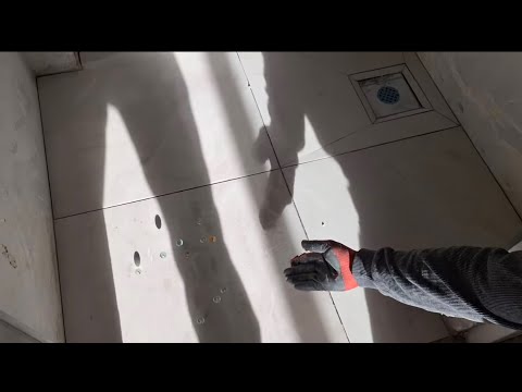 Видео: Как сделать уклон пола в душевой кабине?