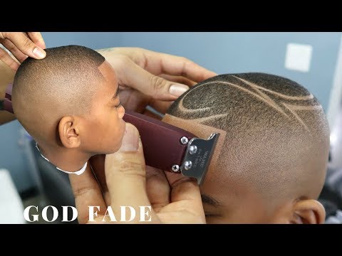 Видео: Урок по стрижке: GOD FADE с дизайном от Chuka the Barber