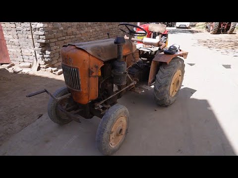 Видео: Эффектная реставрация классического трактора Dong Fang Hong возрастом более 40 лет.