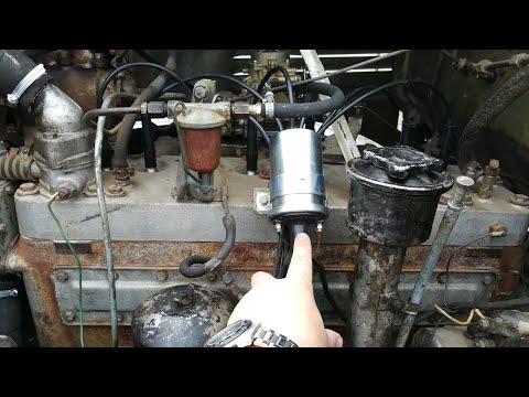 Видео: Зил-157кд. Ремонт и настройка системы зажигания. Коммутатор КТ102. РС507Б, Б114, СЭ 107.