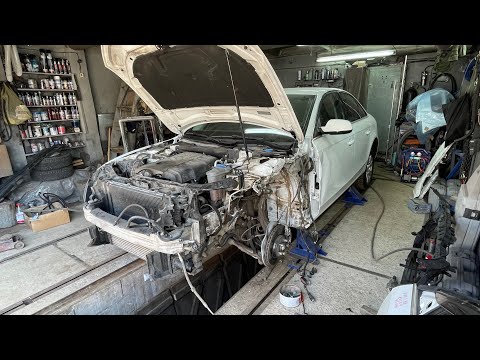 Видео: Audi A4 - ремонт кузова на стапеле