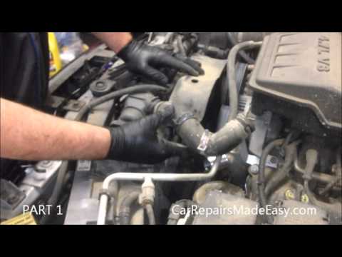 Видео: Замена водяного насоса Dodge Durango, часть 1