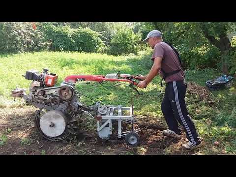 Видео: Копка картофеля самодельной грохотной копалкой