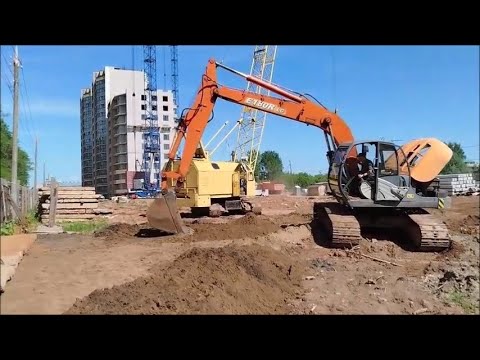 Видео: Экскаватор, бульдозер, гусеничный кран, самосвалы   все нужны на стройке
