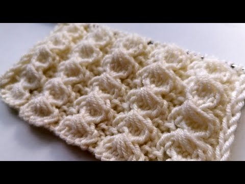 Видео: Ажурный узор спицами. Объемные вертикальные дорожки на ажурном узоре