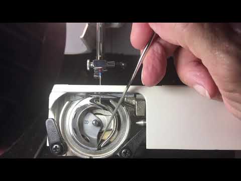 Видео: Как установить высоту игловодителя на машине зигзаг с фронтальной загрузкой 15 класса, которая за...