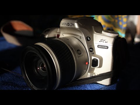 Видео: Обзор Minolta Maxxum STsi / Dynax 404si / α  Sweet S