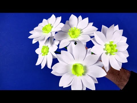 Видео: Как сделать цветы ромашки из бумаги. Цветы из бумаги ромашки