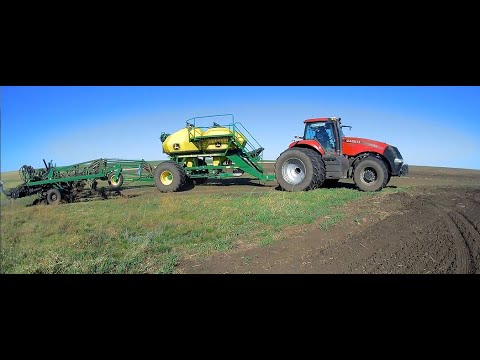 Видео: 6 мая сеем лён . Настройка высева посевной комплекс John Deere. Трактор Case Magnum 340.