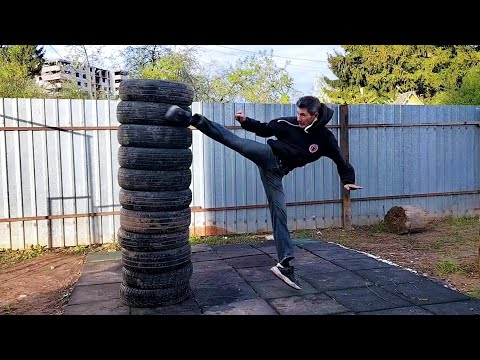 Видео: Ура маваши-гери. Вертушка. Как научиться бить сильный удар ногой используя шины.