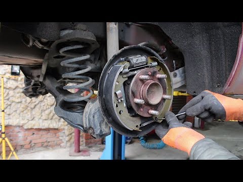Видео: Замена задних барабанных колодок на Ford Focus II 1,6 Форд Фокус 2009 года