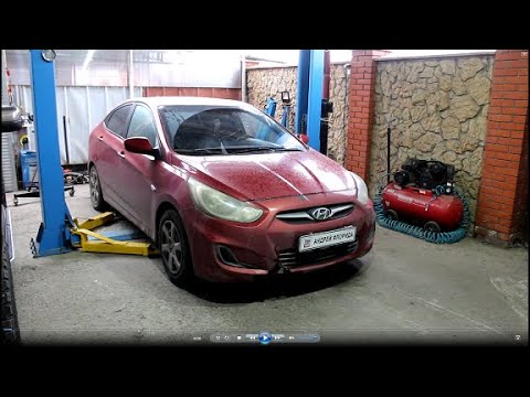 Видео: Замена передних нижних рычагов на Hyundai Solaris 2011 года Хендай Солярис 1,4