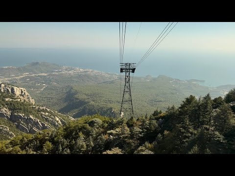 Видео: # 100. Канатная дорога, подъем на вершину. Кемер, Турция.