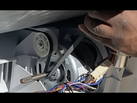 Видео: Как заменить приводной ремень сушильной машины