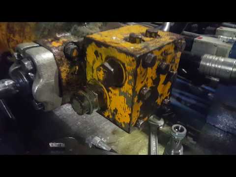 Видео: Предохранительный клапан гидронасоса.