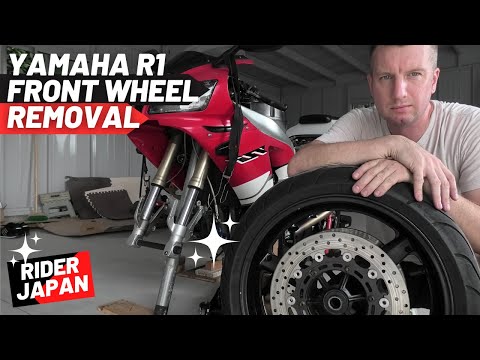 Видео: Подъем передней части Yamaha R1 и снятие колеса