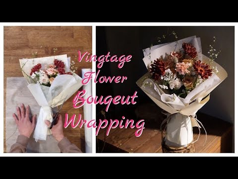 Видео: как обернуть букет цветов