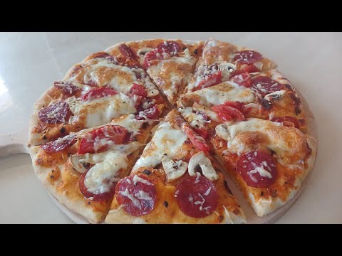 Видео: Итальянская пицца у нас дома, наивкуснейшая,тесто тонкое,начинка изумительная,готовится очень легко 