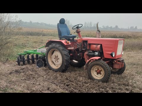 Видео: Дісковка цілин трактором т25. Казали непотяне! потянув як має бути. діскова борона бомет 1.5м