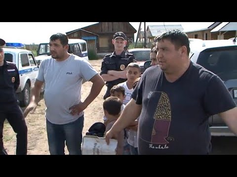 Видео: В Хакасию вернулась цыганская община, но в дома их не пускают