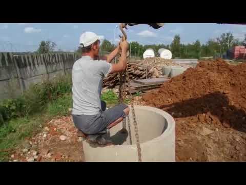 Видео: Как выкопать колодец экскаватором