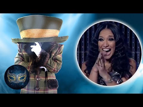 Видео: The Masked Singer - Who's Behind The Hat?! All Is REVEALED | Маскираният певец