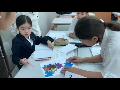 Видео: 5"Ә" сыныбымен "Ондық бөлшекті натурал санға көбейту" тақырыбында ашық сабақ.