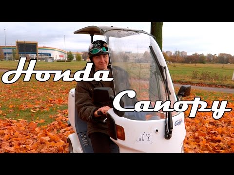 Видео: Обзор скутера Honda Canopy - непогода нипочём!