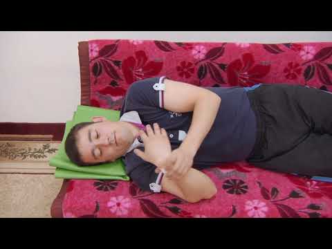 Видео: ЛФК после инсульта - 03.Активно пассивная разработка руки