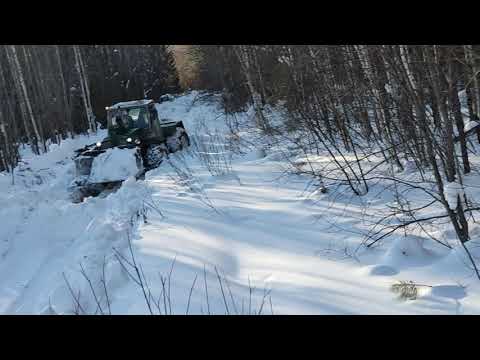 Видео: Т-150К буксует в глубоком снегу.