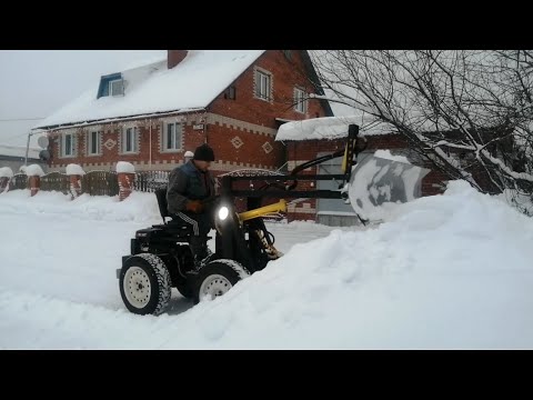 Видео: Новогодняя уборка снега минипогрузчиком Часть41