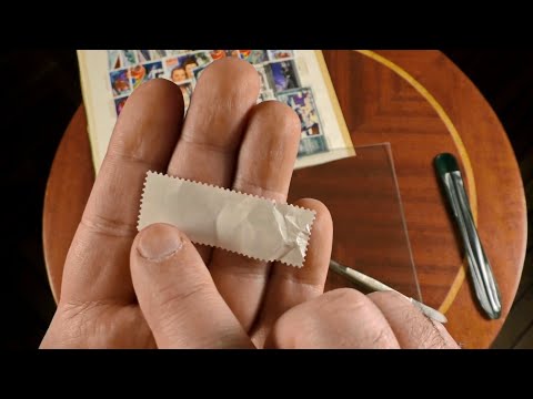 Видео: Как выровнять мятую почтовую марку