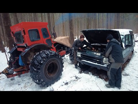 Видео: Поставили колеса от КРАЗа на трактор Т-40АМ и поехали эвакуировать наш Land Rover из леса