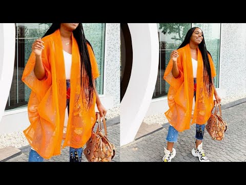 Видео: КАК КРОЙТЕ И СШИВАЙТЕ ЭТУ МОДНУЮ КУРТКУ-КИМОНО С БОКОВЫМИ ВОЛАНАМИ | КУРТКА-КИМОНО С РЮШАМИ #fory...