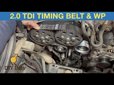 Видео: Замена ремня ГРМ и водяного насоса 2.0 TDI - Audi A3 2004 года