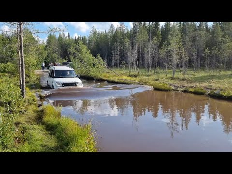 Видео: Карелия: Discovery 4 offroad к горе Воттоваара и озеру Импилампи