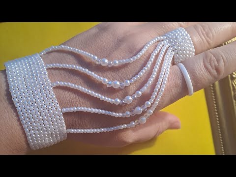 Видео: ЖЕМЧУГ тен БІЛЕЗІК- СЛЕЙВ бисерден білезік жасау