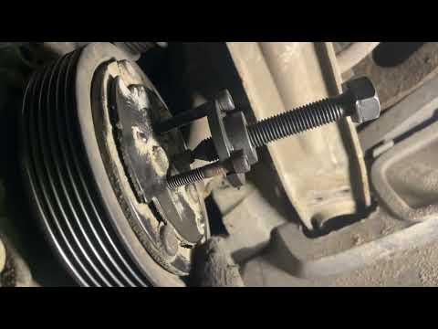Видео: Как снять прижимную пластину компрессора кондиционера