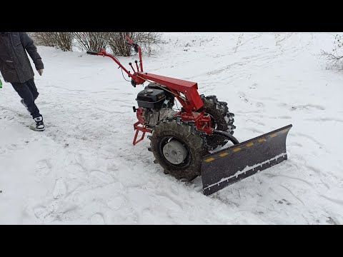 Видео: Чистка снега мотоблоком М.Т.З