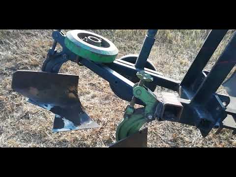 Видео: обзор самоддельного двухкорпусного плуга для мототрактора булат