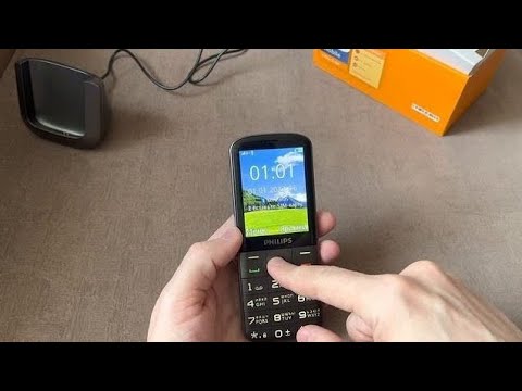 Видео: Мобильный телефон PHILIPS Xenium E227 с док станцией