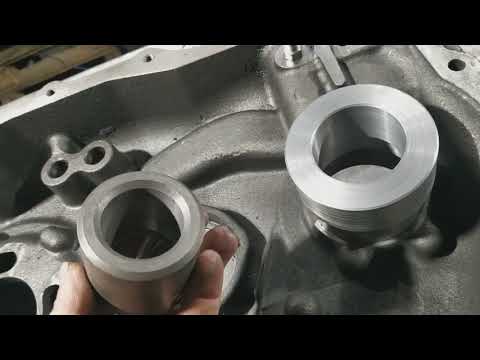 Видео: Ремонт отверстий в КПП экскаватора-погрузчика Вольво БЛ61