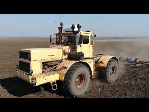 Видео: Трактор Кировец. Боронование. Закрытие влаги.