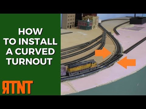 Видео: Как установить изогнутый стрелочный перевод на макет железной дороги